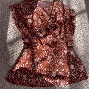 floral blouse perfect for spring! burnt orange with pops of white